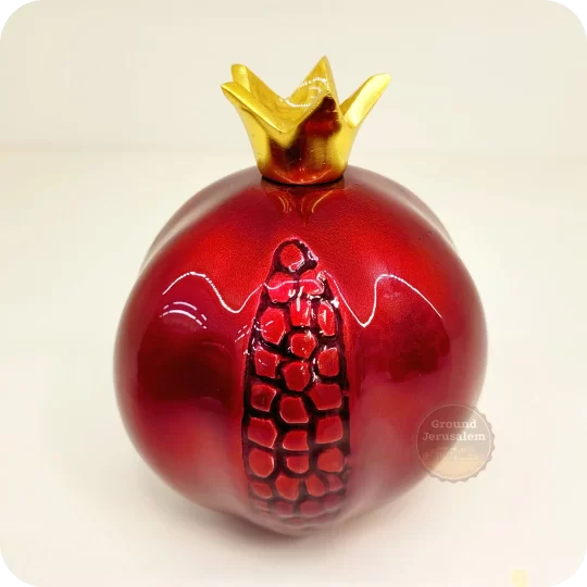 Red pomegranate figurine from Israel